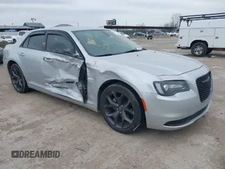 2023 Chrysler 300 Touring with VIN 2C3CCAAG3PH706573, listed as a IAAI auction lot 41603532 with 6,204 mi miles and . Bid and sale history available at DreamBid. Image 1.