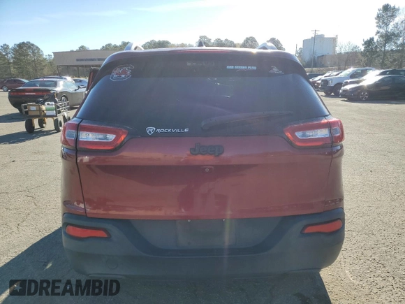 2015 Jeep Cherokee Latitude with VIN 1C4PJLCB5FW695592, listed as a Copart auction lot 50297695 with 108,091 mi miles and Salvage Title. Bid and sale history available at DreamBid. Image 6.