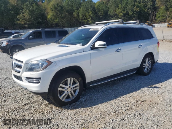 2016 Mercedes-Benz GL with VIN 4JGDF6EEXGA696311, listed as a Copart auction lot 77358304 with 113,398 mi miles and Salvage Title. Bid and sale history available at carsss.com. Image 1.