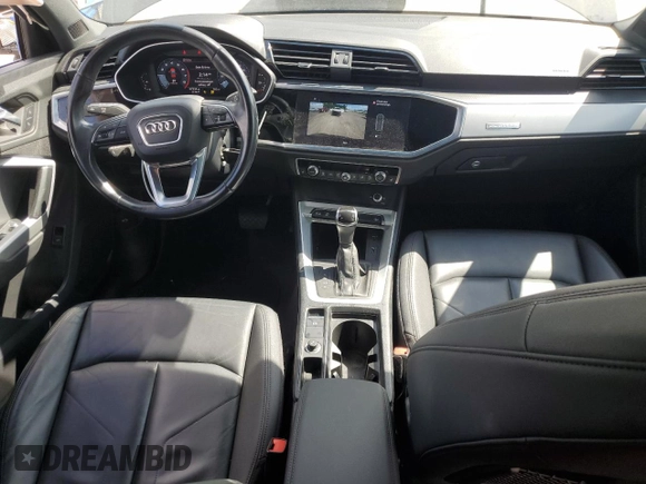 2021 Audi Q3 Premium with VIN WA1AUCF37M1067054, listed as a Copart auction lot 57299815 with 67,334 mi miles and Salvage title. Bid and sale history available at DreamBid. Image 8.