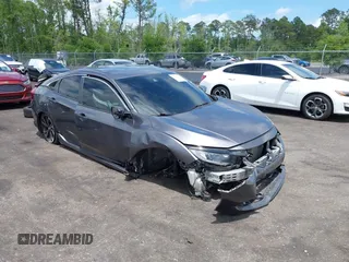 2019 Honda Civic Sport with VIN 2HGFC2F83KH590804, listed as a IAAI auction lot 42139419 with 51,786 mi miles and . Bid and sale history available at DreamBid. Image 1.