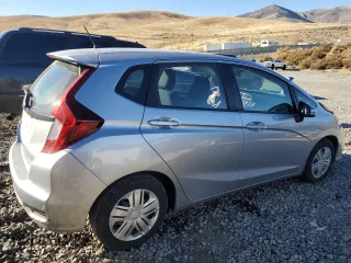 2018 Honda Fit LX with VIN 3HGGK5G46JM703892, listed as a Copart auction lot 79742984 with 67,825 mi miles and Salvage Title. Bid and sale history available at DreamBid. Image 3.