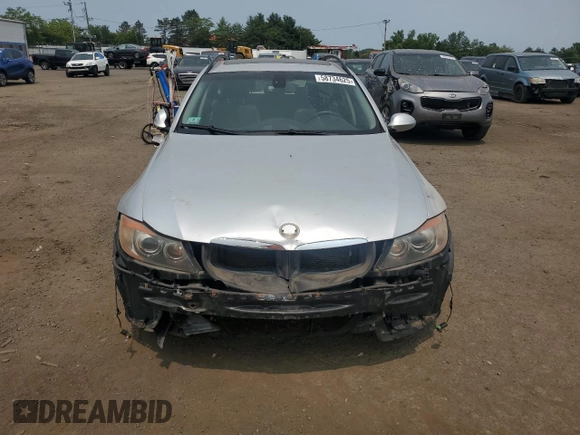 2006 BMW 3 Series 325xi with VIN WBAVT13536KW23228, listed as a Copart auction lot 58734625 with 163,661 mi miles and Salvage title. Bid and sale history available at DreamBid. Image 5.