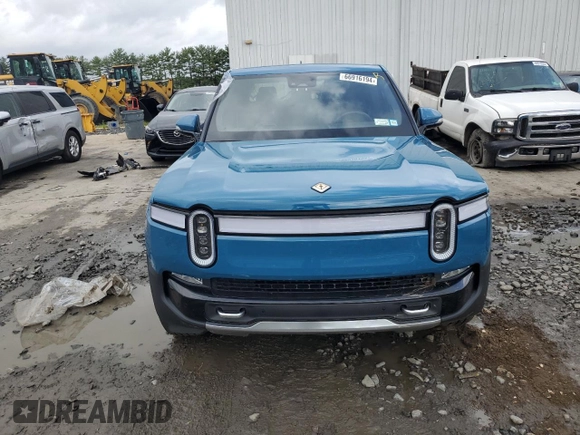 2023 Rivian R1T Adventure with VIN 7FCTGBAA5PN026063, listed as a Copart auction lot 66916194 with Not Provided miles and Salvage Title. Bid and sale history available at DreamBid. Image 5.