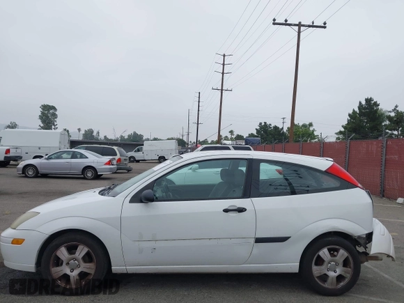 2003 Ford Focus ZX3 with VIN 3FAFP31Z23R147547, listed as a IAAI auction lot 42426117 with 129,860 mi miles and . Bid and sale history available at DreamBid. Image 13.