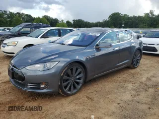 2013 Tesla Model S with VIN 5YJSA1CG6DFP21533, listed as a Copart auction lot 60850815 with 24,220 mi miles and Non repairable. Bid and sale history available at DreamBid. Image 1.