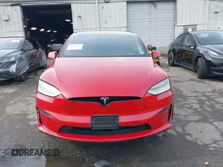 2022 Tesla Model X Plaid with VIN 7SAXCBE60NF330246, listed as a IAAI auction lot 41477394 with 51,612 mi miles and . Bid and sale history available at carsss.com. Image 12.
