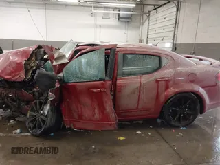 2012 Dodge Avenger SXT with VIN 1C3CDZCB5CN143301, listed as a IAAI auction lot 41632982 with Not Provided miles and . Bid and sale history available at carsss.com. Image 14.