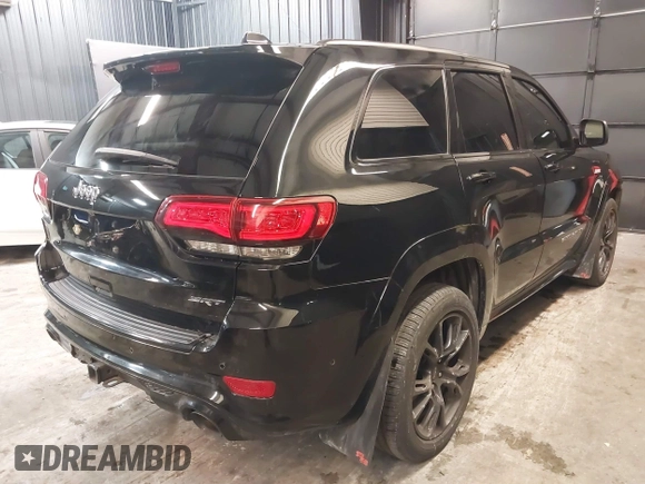 2017 Jeep Grand Cherokee SRT with VIN 1C4RJFDJ9HC819478, listed as a IAAI auction lot 41325490 with 63,551 mi miles. Bid and sale history available at carsss.com. Image 4.