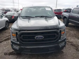 2023 Ford F-150 XL with VIN 1FTFW1E59PFA89187, listed as a IAAI auction lot 41064918 with 62,858 mi miles. Bid and sale history available at carsss.com. Image 12.