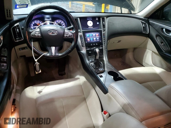 2015 Infiniti Q50 Premium with VIN JN1BV7AP6FM350140, listed as a Copart auction lot 56067465 with 125,241 mi miles and Salvage title. Bid and sale history available at DreamBid. Image 8.