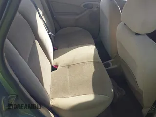 2003 Ford Focus SE with VIN 1FAFP34P13W304346, listed as a IAAI auction lot 42706827 with 239,800 mi miles and . Bid and sale history available at DreamBid. Image 8.