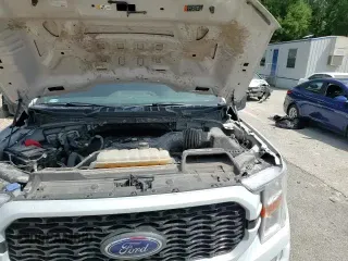 2021 Ford F-150 XL с VIN 1FTEW1CP3MKD30888, выставлен на аукционе Copart как лот 70834225 с пробегом 125 042 миль миль и Списание • Salvage title. История ставок и продаж доступна на DreamBid. Изображение 16.