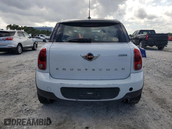 2013 MINI Countryman with VIN WMWZB3C5XDWM31715, listed as a Copart auction lot 57028565 with 95,453 mi miles and Salvage title. Bid and sale history available at DreamBid. Image 6.