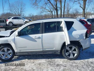2014 Jeep Compass Latitude with VIN 1C4NJCEB1ED560365, listed as a IAAI auction lot 41348657 with 108,931 mi miles. Bid and sale history available at carsss.com. Image 13.
