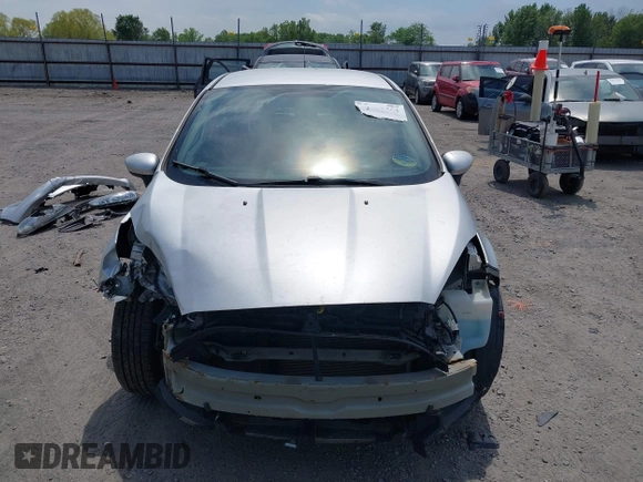 2019 Ford Fiesta SE z VIN 3FADP4EJ9KM107124, wystawiony jako IAAI lot #42067464 z przebiegiem 89 076 mil mil oraz . Historia ofert i sprzedaży dostępna na DreamBid. Obrazek 13.
