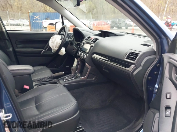 2017 Subaru Forester Touring with VIN JF2SJAWC1HH443799, listed as a IAAI auction lot 41943045 with 122,213 mi miles and . Bid and sale history available at DreamBid. Image 5.