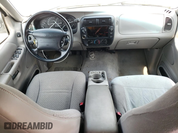 2001 Ford Explorer XLS with VIN 1FMZU72E11ZA76025, listed as a Copart auction lot 61963445 with 266,687 mi miles and Salvage title. Bid and sale history available at DreamBid. Image 8.