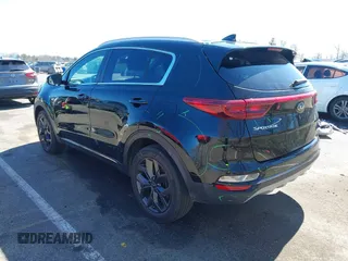 2021 Kia Sportage S with VIN KNDP6CAC6M7887592, listed as a IAAI auction lot 41852917 with 52,185 mi miles and . Bid and sale history available at DreamBid. Image 3.