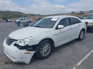 2007 Chrysler Sebring Touring with VIN 1C3LC56R07N536102, listed as a IAAI auction lot 41902390 with 203,037 mi miles and . Bid and sale history available at DreamBid. Image 2.