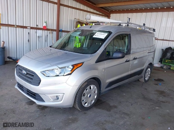 2021 Ford Transit Connect Van XLT with VIN NM0LS7F23M1492352, listed as a IAAI auction lot 41594913 with 90,100 mi miles. Bid and sale history available at carsss.com. Image 2.