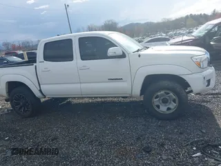 2015 Toyota Tacoma with VIN 3TMLU4EN5FM188601, listed as a IAAI auction lot 41883555 with 143,904 mi miles and . Bid and sale history available at DreamBid. Image 14.