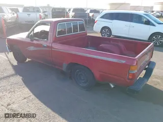 1993 Toyota 2WD Pickups DX with VIN JT4RN81P1P5162011, listed as a IAAI auction lot 41721589 with 207,489 mi miles. Bid and sale history available at carsss.com. Image 3.