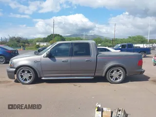 2002 Ford F-150 Harley Davidson with VIN 1FTRW07312KC88379, listed as a IAAI auction lot 41657219 with 1 mi miles. Bid and sale history available at carsss.com. Image 14.