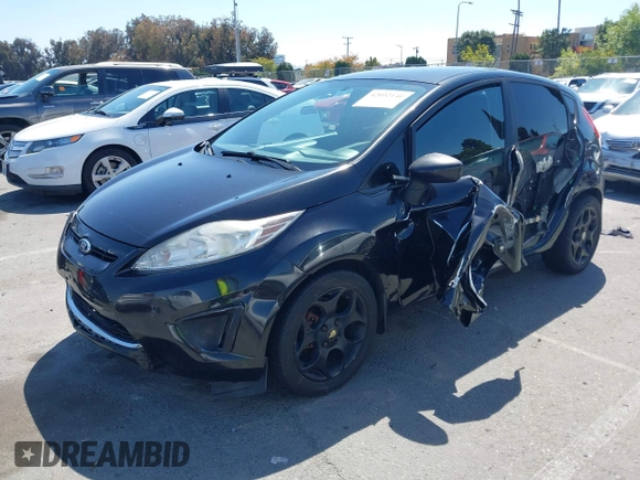 2011 Ford Fiesta SES with VIN 3FADP4FJ9BM181965, listed as a IAAI auction lot 42092140 with 150,304 mi miles. Bid and sale history available at carsss.com. Image 2.