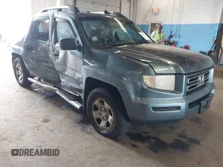 2006 Honda Ridgeline RT z VIN 2HJYK16276H555927, wystawiony jako IAAI lot #42198571 z przebiegiem 256 828 mil mil oraz . Historia ofert i sprzedaży dostępna na DreamBid. Obrazek 1.