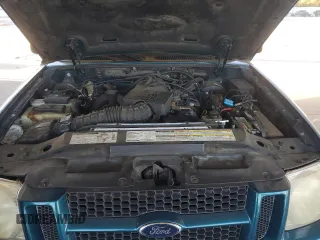 2001 Ford Explorer Sport z VIN 1FMYU60E91UC06378, wystawiony jako Copart lot #76729614 z przebiegiem 182 815 mil mil oraz Szkoda całkowita • Salvage title. Historia ofert i sprzedaży dostępna na DreamBid. Obrazek 11.