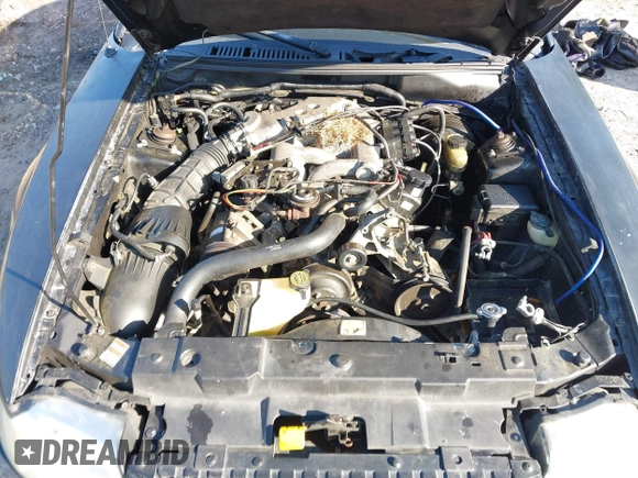 2000 Ford Mustang z VIN 1FAFP404XYF217165, wystawiony jako IAAI lot #41997215 z przebiegiem Nie podano mil oraz . Historia ofert i sprzedaży dostępna na DreamBid. Obrazek 10.