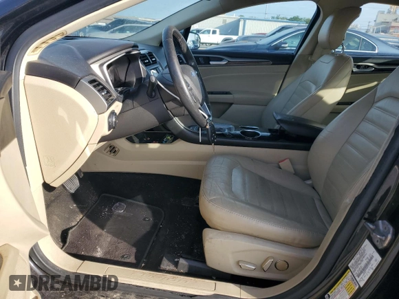 2013 Ford Fusion SE Hybrid с VIN 3FA6P0LU6DR157953, выставлен на аукционе Copart как лот 61175825 с пробегом 125 768 миль миль и Чистый • Clean title. История ставок и продаж доступна на DreamBid. Изображение 7.