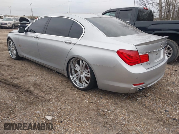 2011 BMW 7 Series 740Li with VIN WBAKB4C5XBC575254, listed as a IAAI auction lot 41617340 with 105,307 mi miles. Bid and sale history available at carsss.com. Image 3.