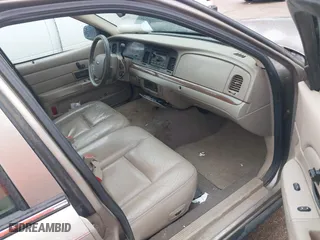 2005 Ford Crown Victoria LX with VIN 2FAFP74W05X174758, listed as a IAAI auction lot 41553606 with 192,103 mi miles. Bid and sale history available at carsss.com. Image 5.