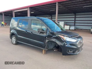 2021 Ford Transit Connect XLT with VIN NM0GS9F27M1500434, listed as a IAAI auction lot 39234991 with 25,883 mi miles and . Bid and sale history available at DreamBid. Image 1.