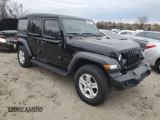 2023 Jeep Wrangler Sport S with VIN 1C4HJXDN1PW596242, listed as a Copart auction lot 82020314 with 30,061 mi miles and Salvage title. Bid and sale history available at DreamBid. Image 4.