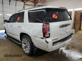 2017 GMC Yukon Denali with VIN 1GKS2CKJ0HR217831, listed as a Copart auction lot 48030555 with 163,050 mi miles and Salvage Title. Bid and sale history available at carsss.com. Image 2.