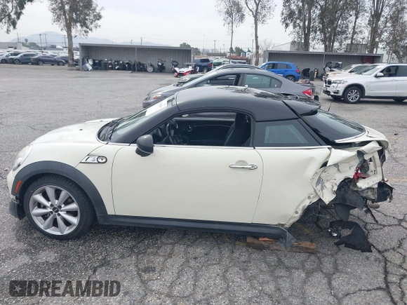 2013 MINI Coupe S with VIN WMWSX3C53DT466648, listed as a IAAI auction lot 41719597 with 106,936 mi miles and . Bid and sale history available at DreamBid. Image 15.