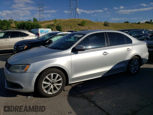 2012 Volkswagen Jetta SE with VIN 3VWDX7AJ4CM077031, listed as a Copart auction lot 67516484 with 201,024 mi miles and Salvage title. Bid and sale history available at DreamBid. Image 1.