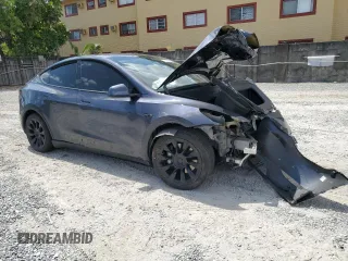 2021 Tesla Model Y Long Range z VIN 5YJYGAEE8MF208854, wystawiony jako Copart lot #56382535 z przebiegiem 47 531 mil mil oraz Nie do naprawy • Non repairable. Historia ofert i sprzedaży dostępna na DreamBid. Obrazek 4.