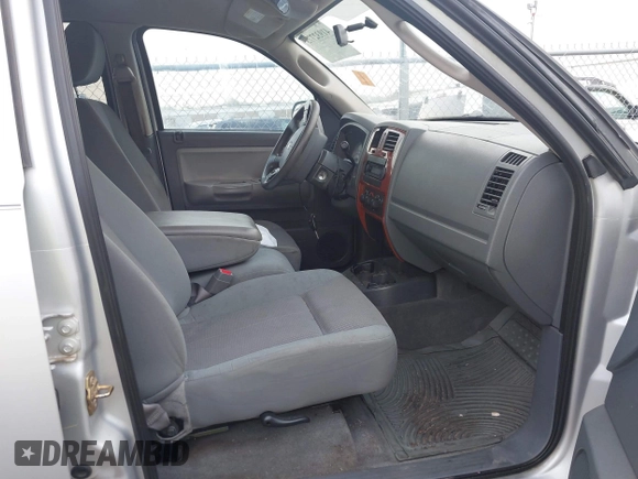 2005 Dodge Dakota SLT with VIN 1D7HE48K25S232893, listed as a IAAI auction lot 41932773 with 209,459 mi miles and . Bid and sale history available at DreamBid. Image 5.