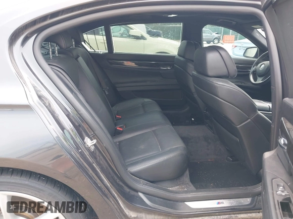 2011 BMW 7 Series 740Li with VIN WBAKB4C58BC574815, listed as a IAAI auction lot 42466704 with 155,292 mi miles and . Bid and sale history available at DreamBid. Image 8.