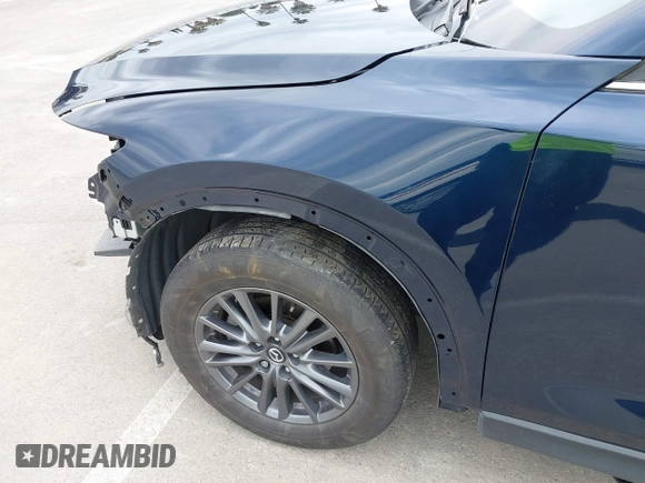 2020 Mazda CX-5 Touring with VIN JM3KFACM2L0856777, listed as a IAAI auction lot 42073972 with 151,628 mi miles. Bid and sale history available at carsss.com. Image 21.