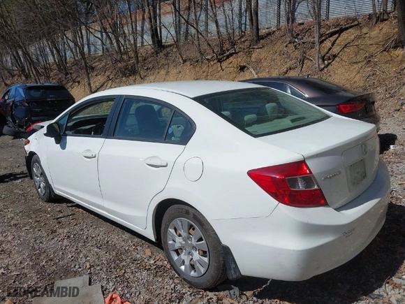 2012 Honda Civic Sdn LX with VIN 2HGFB2F55CH318426, listed as a IAAI auction lot 41856121 with 213,905 mi miles. Bid and sale history available at carsss.com. Image 3.