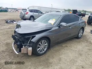 2015 Infiniti Q50 Premium with VIN JN1BV7AP7FM338434, listed as a IAAI auction lot 42158445 with 115,685 mi miles and . Bid and sale history available at DreamBid. Image 2.