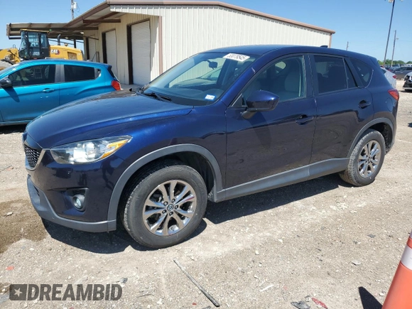 2014 Mazda CX-5 Touring with VIN JM3KE2CY7E0362879, listed as a Copart auction lot 53079545 with 70,863 mi miles and Salvage Title. Bid and sale history available at carsss.com. Image 1.