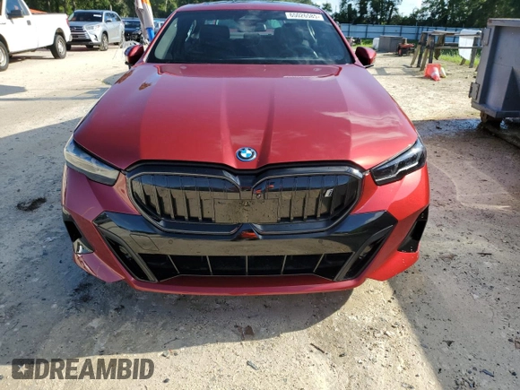2024 BMW i5 eDrive40 with VIN WBY33FK01RCR76500, listed as a Copart auction lot 65026585 with 3,601 mi miles and Salvage title. Bid and sale history available at DreamBid. Image 5.