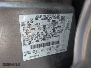 2004 Mazda Tribute LX with VIN 4F2CZ941X4KM19302, listed as a IAAI auction lot 41791389 with 123,036 mi miles. Bid and sale history available at carsss.com. Image 9.