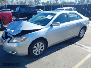2007 Toyota Camry CE with VIN JTNBE46K973037322, listed as a IAAI auction lot 41461438 with 153,723 mi miles. Bid and sale history available at carsss.com. Image 2.